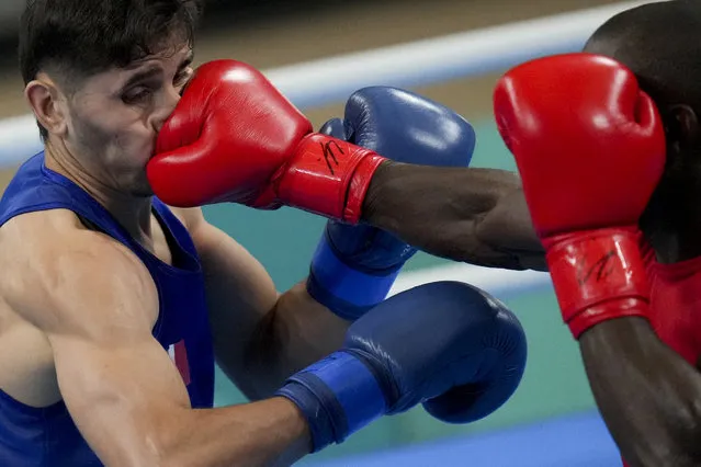 Panama's Eduardo Beckford, right, lands a punch on Mexico's Marco Verde in a men's boxing 71kg semifinal bout at the Pan American Games in Santiago, Chile, Thursday, October 26, 2023. (Photo by Dolores Ochoa/AP Photo)