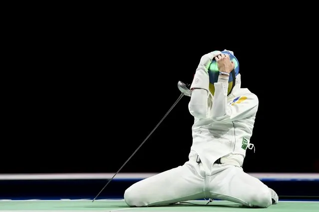Igor Reizlin of Team Ukraine celebrates after winning the Men's Épée Individual Fencing Bronze Medal Bout against Andrea Santarelli of Team Italy on day two of the Tokyo 2020 Olympic Games at Makuhari Messe Hall on July 25, 2021 in Chiba, Japan. (Photo by Annegret Hilse/Reuters)