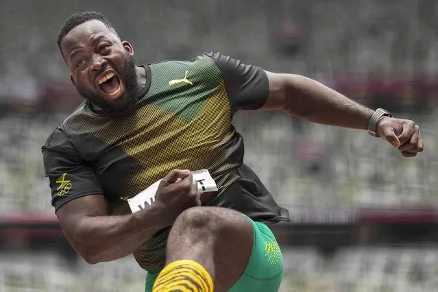 Chad Wright, of Jamaica, competes in his heat of the men's discus throw at the 2020 Summer Olympics, Friday, July 30, 2021, in Tokyo. (Photo by David J. Phillip/AP Photo)