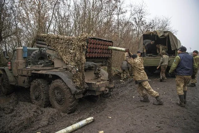 Members of Ukrainian army prepare BM-21 Grad rockets to be launched in Bakhmut, Donetsk, Ukraine on November 26, 2022. (Photo by Metin Aktas/Anadolu Agency via Getty Images)