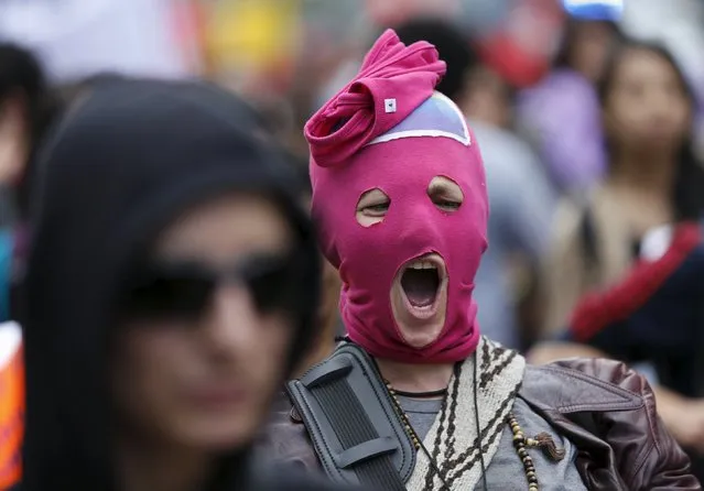 Activists take part during a march to mark International Women's Day along the streets in Mexico City, Mexico, March 8, 2016. (Photo by Henry Romero/Reuters)