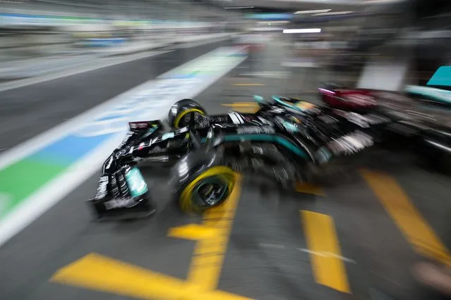 Mercedes driver Lewis Hamilton of Britain leaves the pit lane during practice session for the Saudi Arabian Grand Prix in Jiddah, Friday, December 3, 2021. (Photo by Hassan Ammar/AP Photo)