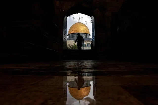 A man walks by the entrance to the al-Aqsa compound, also known to Jews as the Temple Mount, amid the ongoing conflict between Israel and the Palestinian group Hamas, in Jerusalem's Old City on March 7, 2024. (Photo by Ammar Awad/Reuters)