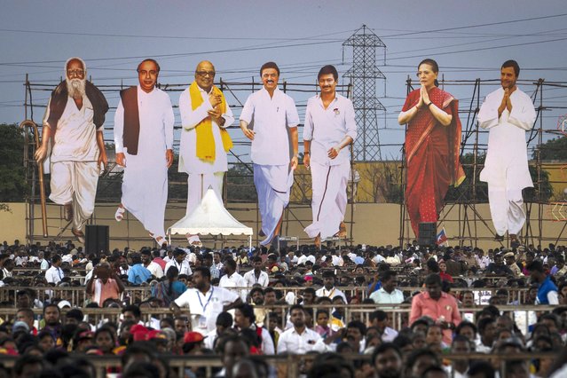 Large cutouts representing Dravida Munnetra Kazhagam and Indian National Congress leaders, tower over supporters during an election campaign rally, on the outskirts of southern Chennai, India, April 15, 2024. Millions of Indians will begin voting in a six-week election that's a referendum on the populist prime minister who has championed a brand of Hindu nationalist politics and is seeking a rare third term as the country's leader. (Photo by Altaf Qadri/AP Photo)