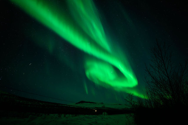 The Aurora Borealis, commonly known as the Northern Lights, are seen in the sky above Kiruna on March 7, 2024 in Kiruna, Sweden. The area is widely regarded as one of the best places in the world to see the phenomenon, which occurs when energized particles from the sun hit the Earth's upper atmosphere. (Photo by Leon Neal/Getty Images)