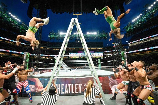 Tyler Bate and Pete Dunne In Action during the 6-Pack Ladder Match on Night One WrestleMania 40 at Lincoln Financial Field on April 6, 2024 in Philadelphia, Pennsylvania. (Photo by WWE/Getty Images)