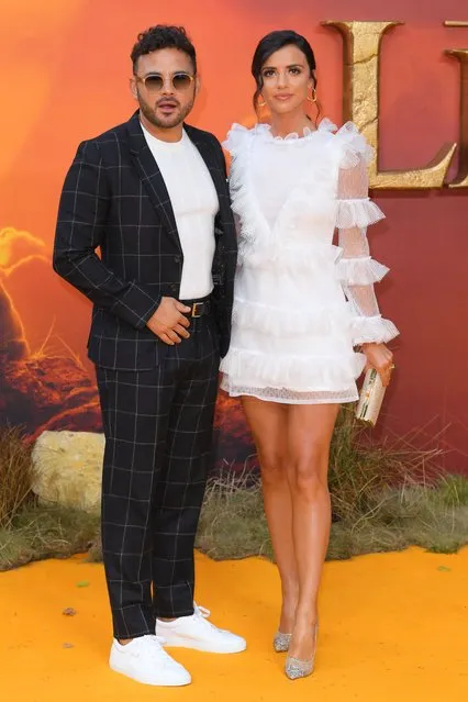 Newly engaged couple Lucy Meck and Ryan Thomas attend “The Lion King” European Premiere at Leicester Square on July 14, 2019 in London, England. (Photo by David Fisher/Shutterstock)