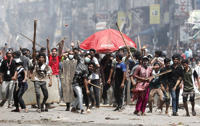 Students take part in the ongoing anti-quota protest in Dhaka on July 18, 2024. Bangladeshi students pressed on July 18 with nationwide protests against civil service hiring rules, rebuffing an olive branch from Prime Minister Sheikh Hasina who pledged justice for 18 killed in the demonstrations. (Photo by Habibur Rahman/ZUMA Press Wire/Rex Features/Shutterstock)