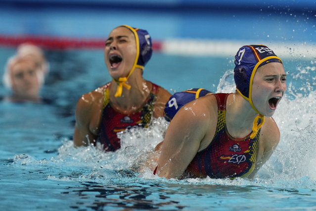 Spain players celebrate after winning during penalties shoot out of a women's Water Polo semifinal match between Netherlands and Spain at the 2024 Summer Olympics, Thursday, August 8, 2024, in Paris, France. (Photo by Luca Bruno/AP Photo)