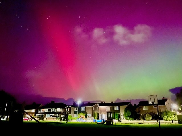 Handout photo taken with permission from the X social media site @TractorWalking, of the Northern Lights on display in the skies over Cromer, Norfolk, UK on Thursday, October 10, 2024. (Photo by @TractorWalking/PA Wire)