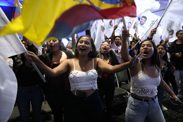 Supporters of Jan Topic, presidential candidate for the Country Without Fear Coalition, cheer during a campaign event ahead of snap elections set for Aug. 20, in Guayaquil, Ecuador, Thursday, August 17, 2023. (Photo by Martin Mejia/AP Photo)