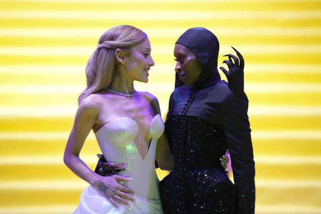British actress Cynthia Erivo, right, and American singer-songwriter Ariana Grande pose for the photographers prior to the the premiere of “Wicked” at Auditorio Nacional in Mexico City, Monday, November 11, 2024. (Photo by Fernando Llano/AP Photo)