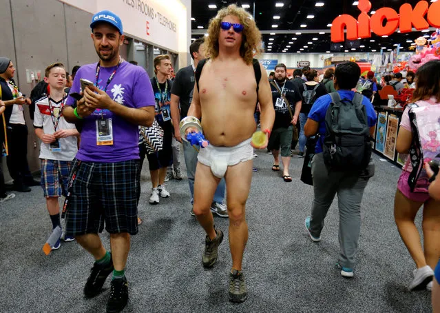A man who called himself Austin dresses in diapers while walking the convention floor at the pop culture event Comic-Con International in San Diego, California, United States July 22, 2016. (Photo by Mike Blake/Reuters)