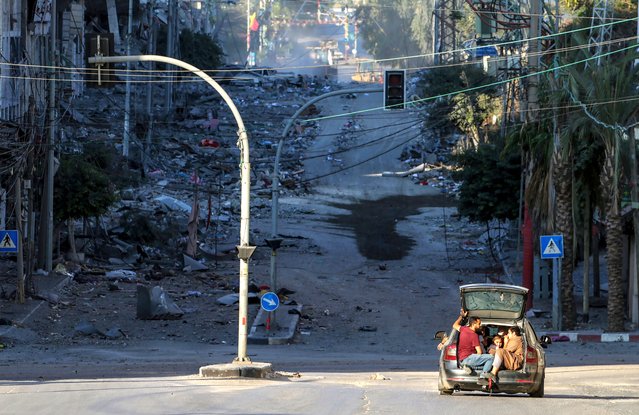 Residents of Gaza City evacuate in a car as Israel continues airstrikes of the Gaza strip, 18 October 2023. More than 3,400 Palestinians and 1,400 Israelis have been killed according to the Israel Defense Forces (IDF) and the Palestinian Health authority since Hamas militants launched an attack against Israel from the Gaza Strip on 07 October. Israel has warned all citizens of the Gaza Strip to move to the south ahead of an expected invasion. (Photo by Mohammed Saber/EPA/EFE)