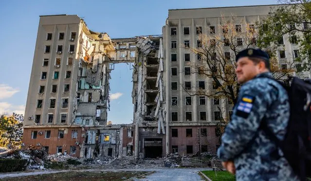 A man stand in front of the damaged regional administration building in Mykolaiv, Ukraine, 31 October 2022. Russian troops on 24 February entered Ukrainian territory, starting a conflict that has provoked destruction and a humanitarian crisis. (Photo by Hannibal Hanschke/EPA/EFE/Rex Features/Shutterstock)