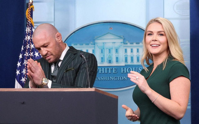 Irish UFC fighter Conor McGregor stands at the briefing room lectern, with White House press secretary Karoline Leavitt at his side, during a visit to the White House on March 18, 2025. (Photo by Kevin Lamarque/Reuters)