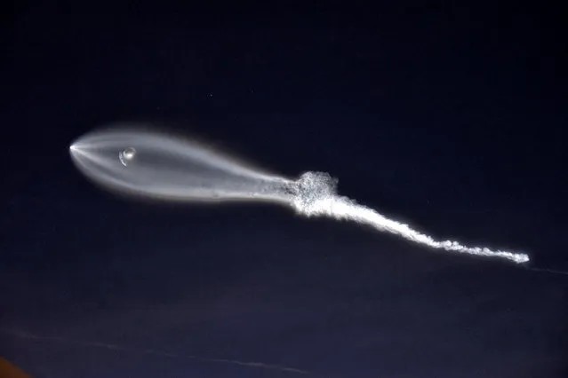 SpaceX's Falcon 9 rocket lifts off in the air, as seen from Santa Monica, California, U.S., in this December 22, 2017 picture obtained from social media. (Photo by Joshua Berson/Twitter/@bersonphoto via Reuters)