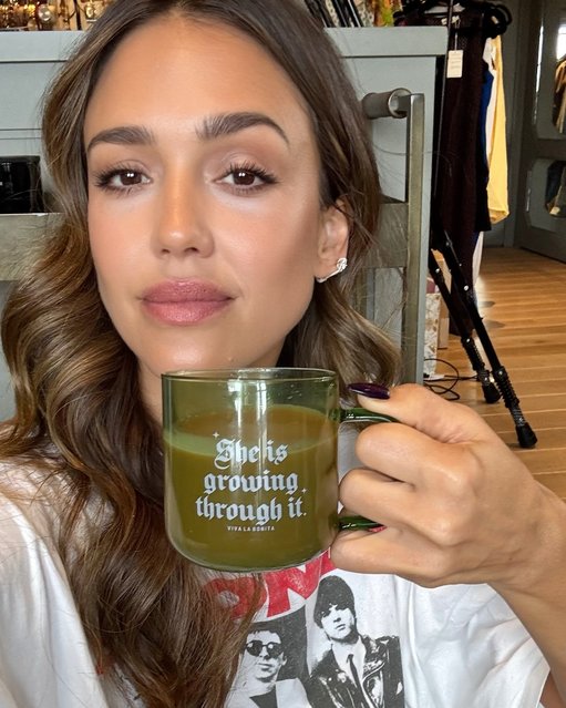 American actress Jessica Alba sips from a “She is growing through it” mug while recovering from an injury in the second decade of April 2025. (Photo by jessicaalba/Instagram)
