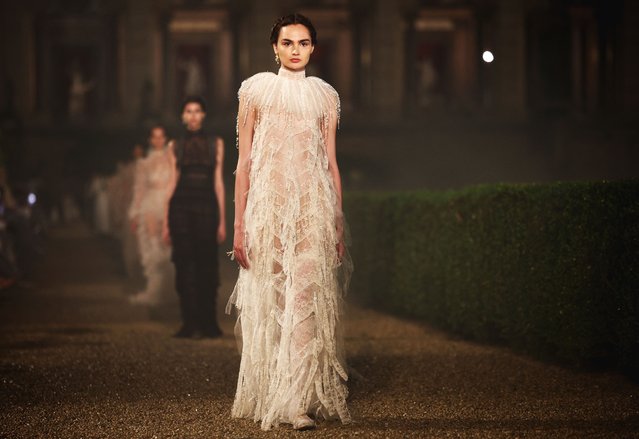 Models present creations by designer Maria Grazia Chiuri during the Christian Dior Cruise 2026 collection show at Villa Albani Torlonia in Rome, Italy, on May 27, 2025. (Photo by Guglielmo Mangiapane/Reuters)