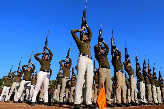 Indian women police officers participate in the rehearsal for the upcoming 69th Republic Day celebration parade, in Bhopal, India, 19 January 2018. Republic Day, observed on 26 January each year, marks the adoption of the constitution and the transition of India from British regime to a republic on 26 January 1950. (Photo by Sanjeev Gupta/EPA/EFE)