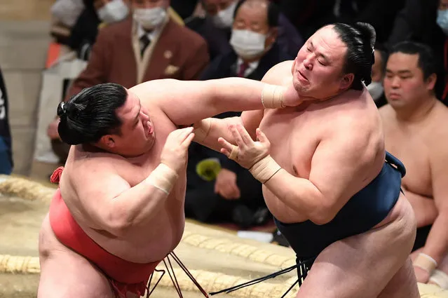 Onosho (L) and Tamawashi (R) compete on day twelve of the Grand Sumo New Year Tournament at Ryogoku Kokugikan on January 19, 2023 in Tokyo, Japan. (Photo by The Asahi Shimbun via Getty Images)