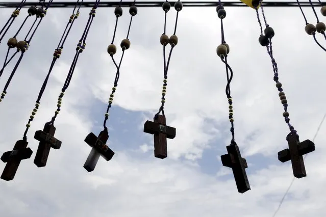 Rosaries of Black Christ of Portobelo are seen during the annual celebratory pilgrimage in Portobelo, in the province of Colon October 21, 2015. Thousands of devotees gather at the Festival of the Black Christ every year to celebrate Christ's miracles. (Photo by Carlos Jasso/Reuters)