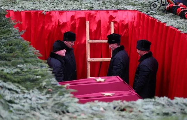 Participants attend a ceremony to rebury the remains of Red Army soldiers, who were killed in World War Two, ahead of the 80th anniversary of Soviet victory in the Battle of Stalingrad, in the Volgograd region, Russia on February 1, 2023. (Photo by Kirill Braga/Reuters)