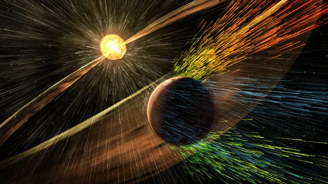 This image made available by NASA on Thursday, November 5, 2015 shows an artist's rendering of a solar storm hitting the planet Mars and stripping ions from the planet's upper atmosphere. NASA's Mars-orbiting Maven spacecraft has discovered that the sun robbed the red planet of its once-thick atmosphere and water. On Thursday, scientists reported that even today, the solar wind is stripping away about 100 grams of atmospheric gas every second. (Photo by Goddard Space Flight Center/NASA via AP Photo)