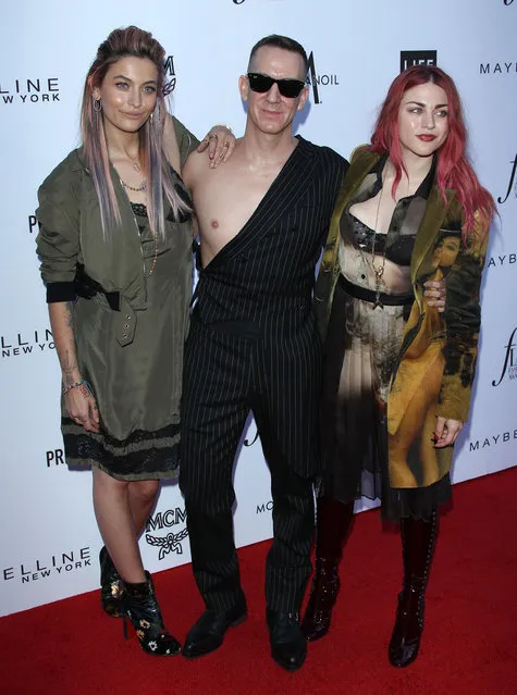 Paris Jackson, from left, Jeremy Scott and Frances Bean Cobain arrive at the Daily Front Row's Fashion Los Angeles Awards at the Beverly Hills Hotel on Sunday, April 8, 2018, in Beverly Hills, Calif. (Photo by  Jen Lowery/Splash News and Pictures)