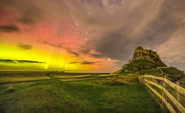 Pictured on Saturday evening is the northern lights over Lindisfarne Castle on Holy Island near Berwick-upon-Tweed, Northumberland, United Kingdom on October 22, 2022. (Photo by Carol Macleod/Picture Exclusive)