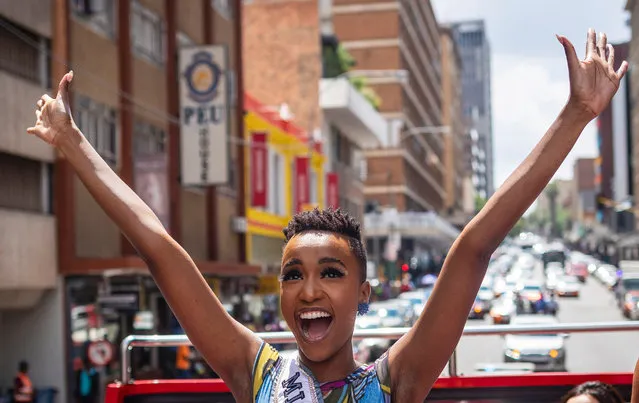 Miss Universe Zozibini Tunzi (C) waves at fans as she is driven through the streets of Johannesburg during her homecoming parade after being crowned in December 2019, Johannesburg, South Africa, 13 February 2020. Zozibini is the first black women to win the title. Miss Universe is an annual international beauty pageant that is run by the United States-based Miss Universe Organization. (Photo by Kim Ludbrook/EPA/EFE)