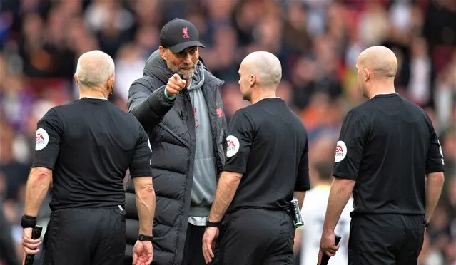 Liverpool's manager Jurgen Klopp reacts with the Referees after the English Premier League soccer match between Liverpool and Tottenham Hotspur, in Liverpool, Britain, 30 April 2023. (Photo by Peter Powell/EPA)