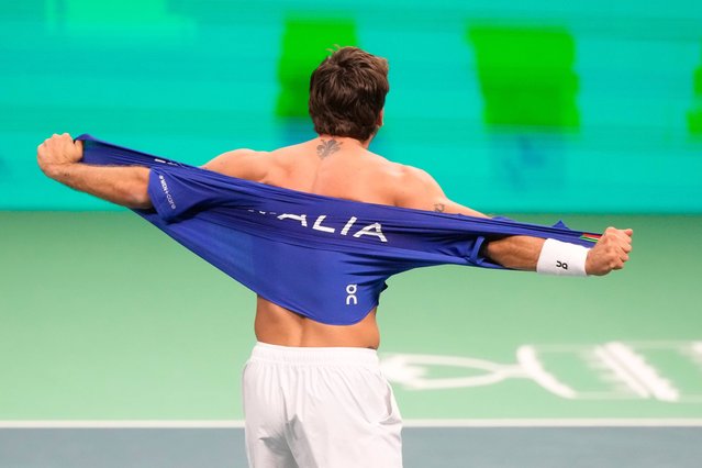 Italy's Flavio Cobolli celebrates after winning against Belgium's Zizou Bergs during a Davis Cup singles semifinal match between Italy and Belgium, in Bologna, Italy, Friday, November 21, 2025. (Photo by Luca Bruno/AP Photo)