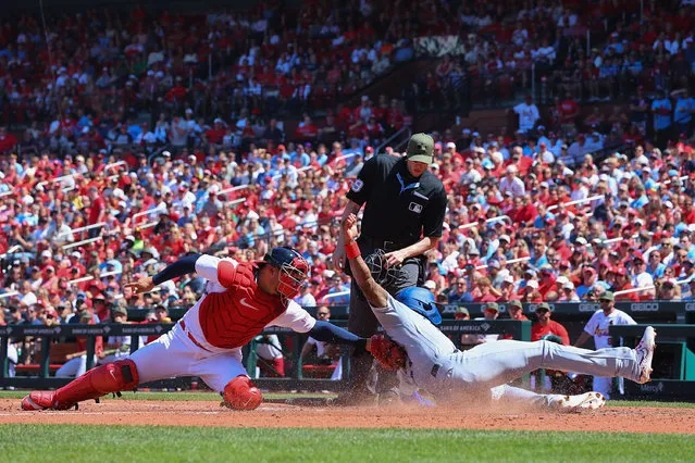 Jason Heyward #23 of the Los Angeles Dodgers scores a run against Willson Contreras #40 of the St. Louis Cardinals in the fifth inning at Busch Stadium on May 21, 2023 in St Louis, Missouri. (Photo by Dilip Vishwanat/Getty Images)