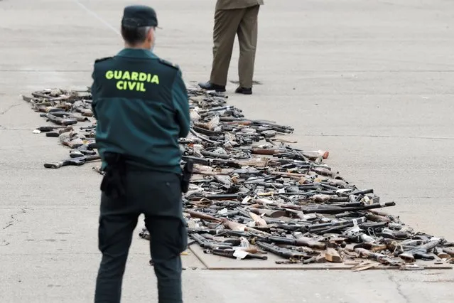 Seized weapons ready to be destroyed at the Civil Guards Academy in Valdemoro, Madrid, 04 March 2021. The weapons were seized in anti-terrorism operations throughout decades. (Photo by Chema Moya/EPA/EFE)