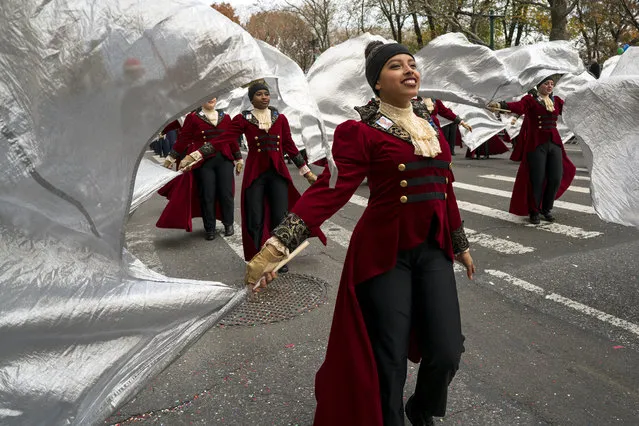 Members of the Hendrickson High School band from Pflugerville, Texas, march on Central Park West during the Macy's Thanksgiving Day Parade in New York Thursday, November 24, 2016. (Photo by Craig Ruttle/AP Photo)