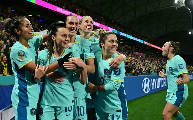 Australia players celebrates with Hayley Raso after scoring her 2nd goal during the FIFA Women's World Cup 2023 soccer match between Canada and Australia at Melbourne Rectangular Stadium in Melbourne on Monday, July 31, 2023. (Photo by Joel Carrett/AAP Image)
