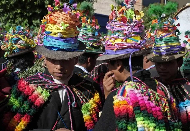 Members of the indigenous group of San Pedro de Condo participate during the Anata Andina (Andean carnival) parade in Oruro, February 12, 2015. (Photo by David Mercado/Reuters)
