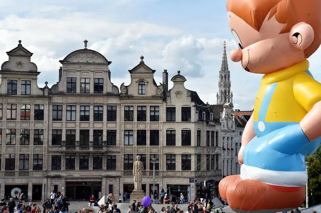 A giant balloon of Billy, character from a comic strip, floats during the Balloon Day Parade in Brussels, Belgium on September 17, 2018. (Photo by Eric Vidal/Reuters)