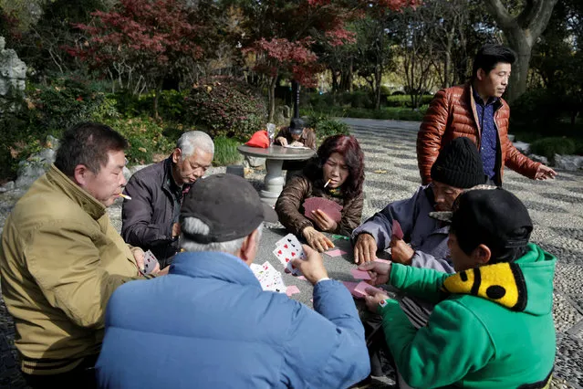 People play cards at a park in Shanghai, China December 2, 2016. (Photo by Aly Song/Reuters)