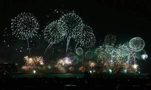 Fireworks explode in the sky over Dubai, United Arab Emirates. (Photo by Mohammed Omar /Reuters)