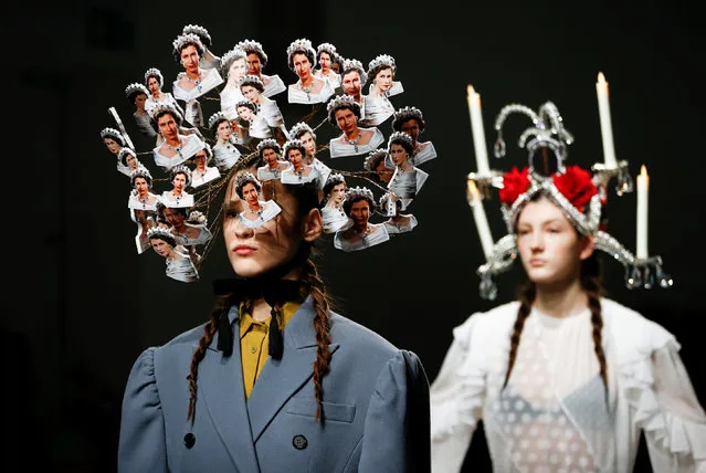 A model presents a creation adorned with images of Britain's Queen Elizabeth II during the pushBUTTON catwalk show at London Fashion Week Women's A/W19 in London, Britain February 19,  2019. (Photo by Henry Nicholls/Reuters)