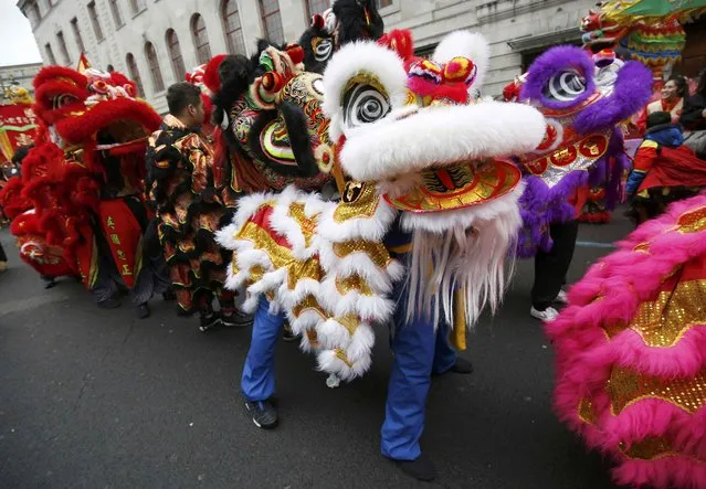 Participants wear traditional costumes as they take part in an event to celebrate the Chinese Lunar New Year of the Rooster in London, Britain, January 29, 2017. (Photo by Neil Hall/Reuters)