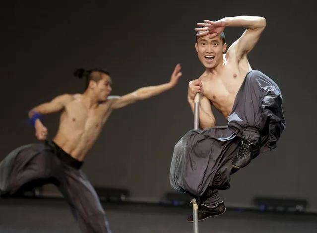 China's Contemporary Dragon Kungfu Company dancers with the show “Gateway” perform in Riga, Latvia, May 5, 2015. (Photo by Ints Kalnins/Reuters)