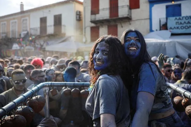 Revellers participate in a colourful “flour war”, celebrating the “Ash Monday” or “Clean Monday”, a traditional festivity marking the end of the carnival season and the start of the 40-day Lent period until the Orthodox Easter, in the town of Galaxidi, Greece, on March 18, 2024. (Photo by Louisa Gouliamaki/Reuters)