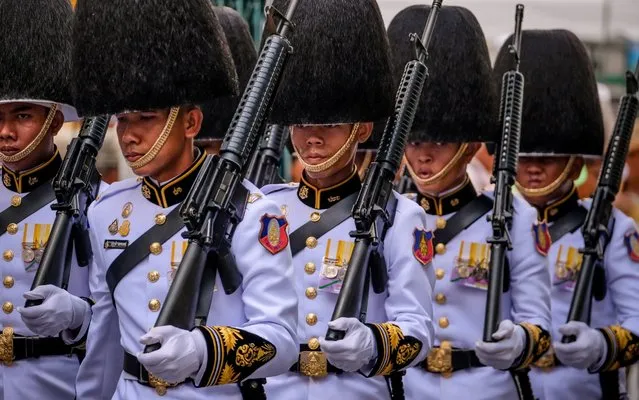 Royal Guards march during the coronation of Royal Coronation of King Rama X on May 4, 2019 in Bangkok, Thailand. Thailand held its first coronation for the first time in nearly seven decades as King Maha Vajiralongkorn, also known as Rama X, was crowned on Saturday following an extended mourning period for King Bhumibol Adulyadej, who died in October 2016 at the age of 88. The elaborate three-day ceremony reportedly cost around $31 million as King Vajiralongkorn circled around parts of Bangkok on a royal palanquin after being presented with a gold 7.3-kilogram crown and a sacred nine-tiered umbrella. (Photo by Linh Pham/Getty Images)