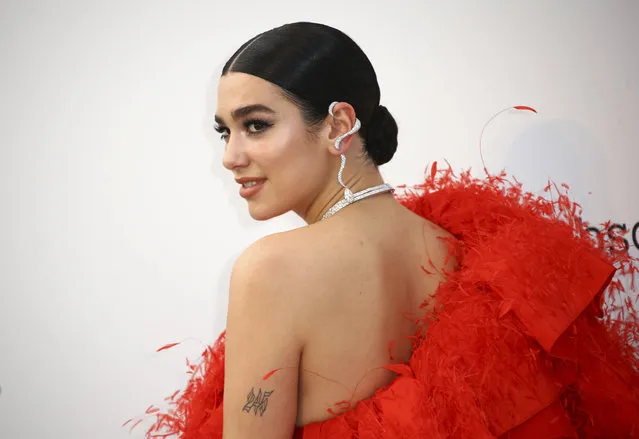 Singer Dua Lipa poses for photographers upon arrival at the amfAR, Cinema Against AIDS, benefit at the Hotel du Cap-Eden-Roc, during the 72nd international Cannes film festival, in Cap d'Antibes, southern France, Thursday, May 23, 2019. (Photo by Joel C. Ryan/Invision/AP Photo)