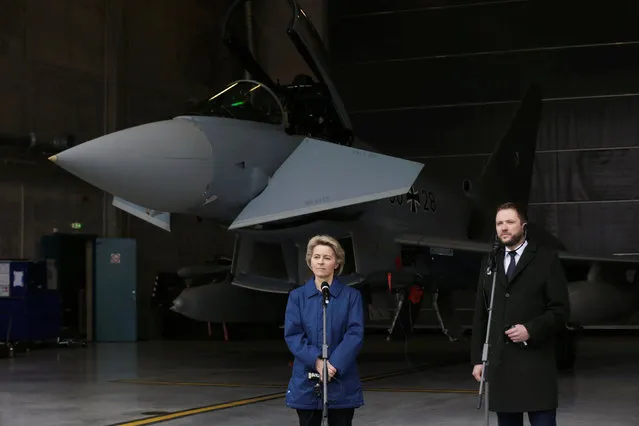 German Defence Minister Ursula von der Leyen and her Estonian counterpart Margus Tsahkna listen to media in Amari air base, Estonia, March 2, 2017. (Photo by Ints Kalnins/Reuters)