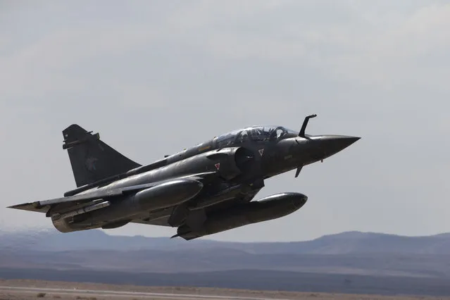 In this Wednesday, November 8, 2017 file photo, a French Mirage 2000D jet fighter takes off from Ovda airbase near Eilat, southern Israel, during the 2017 Blue Flag exercise. A French fighter jet carrying two pilots has disappeared from radar screens near the Swiss border. A French air force spokeswoman said the Mirage 2000D was last detected Wednesday in a snow-covered mountainous area between the Doubs and Jura regions (Photo by Ariel Schalit/AP Photo)