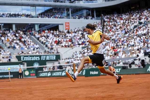 Germany's Alexander Zverev plays a shot against Spain's Carlos Alcaraz during the men's final of the French Open tennis tournament at the Roland Garros stadium in Paris, France, Sunday, June 9, 2024. (Photo by Jean-Francois Badias/AP Photo)